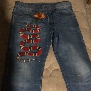 Gucci jeans with a snake